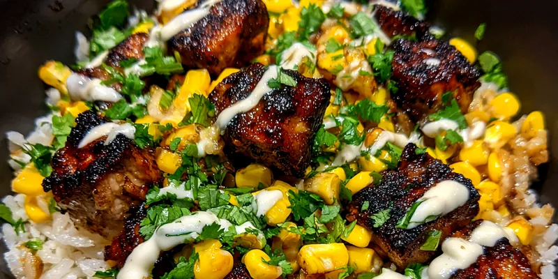 A beautifully presented Grilled Chicken Street Corn Bowl with vibrant colors and fresh ingredients.